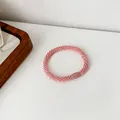 Pink braided high-elastic hair tie with matching smooth plastic clasp for women - Pink