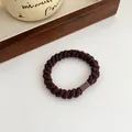 Dark coffee spiral elastic hair tie with durable woven texture and plastic connector - Dark Coffee
