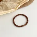 Brown high-elasticity hair tie with a durable twisted texture and retro matte finish - Brown