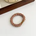 Elastic brown braided spiral hair tie with matching square resin buckle accent - Light Coffee