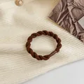 Thick dark brown twist hair tie with premium elastic fiber and leather-wrapped joint - Brown