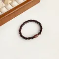 Elastic dark brown woven hair tie with white stitching and smooth brown connector buckle - Dark Coffee