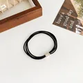 Three-strand elastic black hair tie with gold rhinestone-encrusted metal buckle - Black