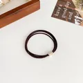 Dark multi-strand elastic hair tie with a gold rhinestone-encrusted metal buckle - Dark Coffee