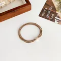 Brown multi-strand elastic hair tie featuring a sparkling rhinestone metal buckle - Khaki