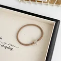 Elastic coffee brown hair tie with a gold heart rhinestone pendant charm for women - Khaki