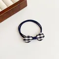 Navy blue elastic hair tie with a black and white gingham bow detail for girls - Navy Blue