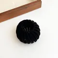 Retractable black velvet bird nest hair clip for bun and ponytail styling - Black