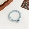 Minimalist light blue multi-strand elastic hair tie with woven ball bead detail - Blue