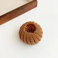 Caramel brown flocked bird nest hair clip with velvety texture and retractable design - Brown