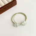 Pale green hair tie set with classic green and white gingham bow decoration - Green