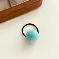 Elastic hair tie featuring a soft light blue faux fur pompom for girls - Blue