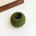 Dark green velvet flocked bird nest hair clip with expandable matte resin claw design - Green