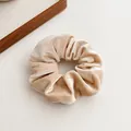 French vintage style velvet scrunchie in champagne beige with soft fabric texture - Apricot
