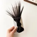 Messy bun hair claw clip in natural black synthetic fiber for high ponytail volume - Black Brown