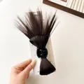 Dark brown messy bun hair claw clip with synthetic hair on a decorative card - Dark Brown