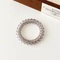 Élastique à cheveux spirale gris fumé translucide pour queue de cheval sans trace - Gris clair