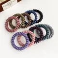Lot de 10 élastiques cheveux spirale mats couleurs Morandi sur fond blanc avec décor - Mélange Aléatoire