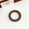 Élastique à cheveux spirale marron foncé mat avec texture givrée haute élasticité - Marron