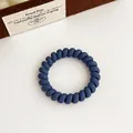 Élastique à cheveux spirale bleu marine mat avec finition givrée et élastique - Bleu royal