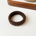 Coffee brown thick elastic hair tie with ribbed texture and durable seamless design - Brown