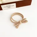 Beige bow hair tie made of durable ribbed high-elastic fabric for a seamless ponytail - Khaki