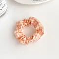 Plaid scrunchie hair tie with orange gingham pattern for high ponytail styles - Pink
