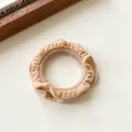 Elastic coffee-colored ruffle scrunchie made of soft fabric for ponytail styling - Beige