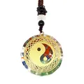Close-up of Tai Chi energy pendant with colorful natural crystal stones and resin casing - Tai Chi Style (1)