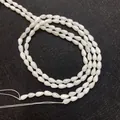 Handgefertigte 5x8mm tropfenförmige Muschelperlen aus Naturperlmutt für DIY-Schmuck - Weiß
