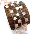 Irisierende rosa Perlmuttern-Sternperlen, gewickelt um eine natürliche Holzstütze - 8mm / Rosa