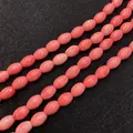 Roze synthetische koraal ovale kralen voor DIY sieraden maken ketting en accessoires - Gladde Rijstkraal / 7x10mm (50 stuks/verpakking)