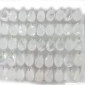 Pendentifs en quartz blanc facettés en forme de goutte avec boucles en métal argenté - Forme de goutte facettée / Cristal blanc