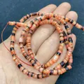 Bunter Strang aus gestreiften Muschel-Zylinderperlen für DIY-Schmuck in der Hand - 5-8 mm / Orange Weiß Schwarz Braun (Nr.27)