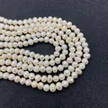 Detailopname van natuurlijke barokke zoetwaterparels met glans en groeitekens - 4-5mm / AB Kleur