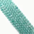 Macro shot of faceted light green natural stone beads for DIY jewelry making - Blue Chalcedony