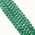 Macro view of faceted green gemstone beads for jewelry making with high gloss finish - Green Aventurine