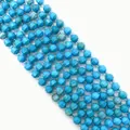 Faceted turquoise style natural stone beads in bright blue with dark brown marble veins - Turquoise