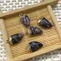 Set of five purple jasper horn-shaped pendants with gold-plated metal caps and loop rings - Rhodonite with Black Lines