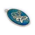 Detail of oval blue stone pendant with golden fish inlay and metallic frame design - Hollow Goldfish Pattern (2)