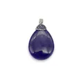 Macro shot of purple teardrop amethyst pendant with crystal-encrusted silver clasp - Purple Chalcedony