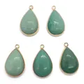 Detailed macro view of five water drop green stones with gold plated frames and top loops - 18x30mm / Green Aventurine