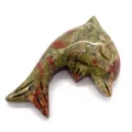 Natural Unakite stone dolphin pendant carving with polished finish and mineral texture - Unakite