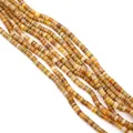 Macro shot of colorful cylindrical Heishi beads with natural texture for DIY jewelry making - Warm Tone Multicolor (No.1)