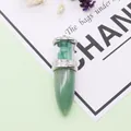Detail of green aventurine bullet pendant with silver metal and crushed stone filling - Green Aventurine