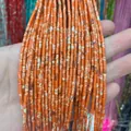 Brins de perles cylindriques en jaspe sédimentaire orange avec marbrures crème - N°4 Jaspe Impérial (Sédiment Orange) / 2x4mm