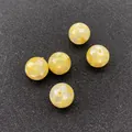 Macro shot of 5 yellow shell beads with mosaic pattern for DIY necklace making - Small / Yellow Shell