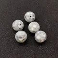 Macro shot of mosaic mother-of-pearl sphere beads with natural iridescent texture for DIY - Small / Grey Shell