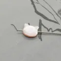 Macro detail of natural pink shell owl-shaped bead with iridescent luster for DIY jewelry - Horizontal Hole Cat Head / Pink