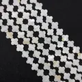 Macro detail of white mother of pearl clover beads with natural iridescent luster - Four-Petal Flower / Small Size